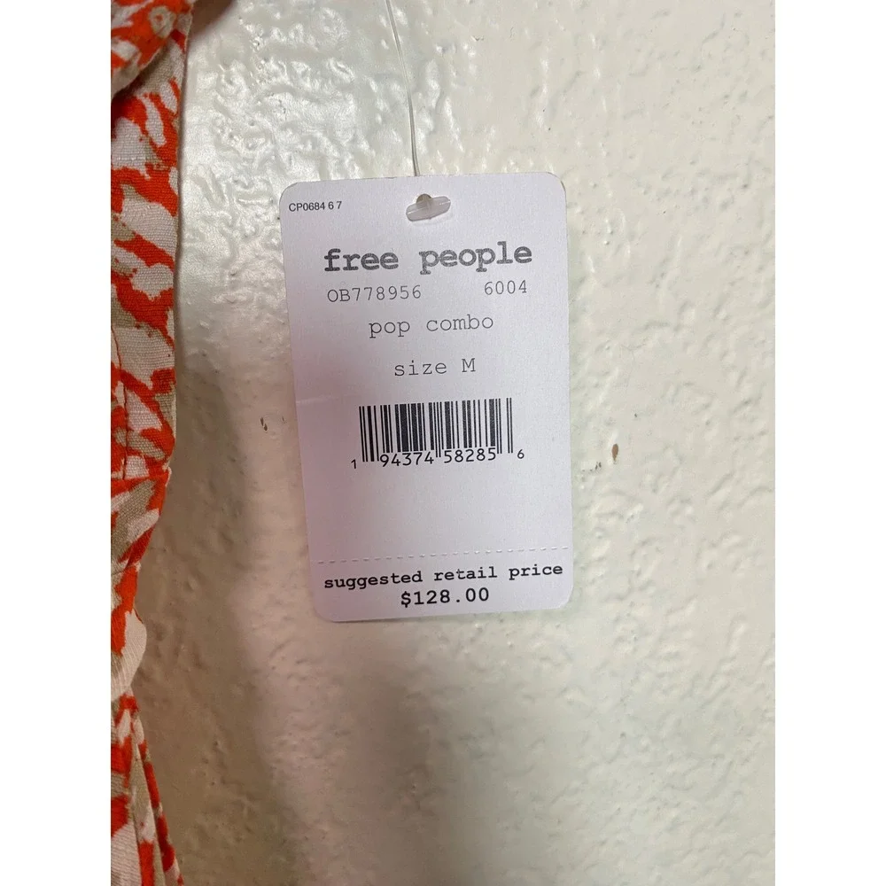 Free People French Quarter Orange Abstract Ruffle Wrap Mini Dress Medium NWT